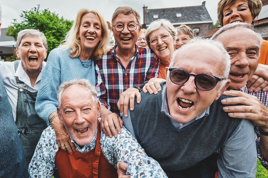 joyful-seniors-taking-a-group-selfie-4TC7ZZ8.jpg